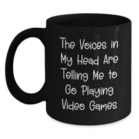 Load image into Gallery viewer, Funny Playing Video Games Quotes Gift for Men - Birthday Unique Gifts from Friends - Black Coffee Mug for Gamers, 'The Voices In My Head Are Telling Me To Go Play' - Main