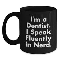 Load image into Gallery viewer, Fun and genius Dentist Gifts from Friends, Unique Graduation Presents for Men, Women, or Coworkers, I'm A Dentist. I Speak Fluently In genius. Black Coffee Mug - Main