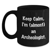 Load image into Gallery viewer, Funny Archeologist Gifts from Family to Daughter Graduation Unique Gifts - Keep Calm, I'm (almost) An Archeologist Black Coffee Mug for Men Women Friends - Main