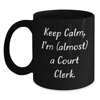 Load image into Gallery viewer, Funny Court Clerk Gifts from Friends - Keep Calm, I&#39;m (almost) A Court Clerk. - Black Coffee Mug for Court Clerk Birthday - Main
