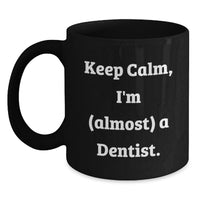 Load image into Gallery viewer, Dentist Humor Graduation Gift from Friends - Funny Black Coffee Mug with 'Keep Calm, I'm (almost) A Dentist.' Quote - Unique Birthday Unique Gift for Men or Women - Main