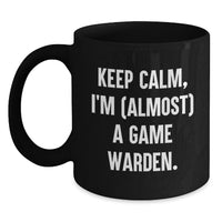 Load image into Gallery viewer, Funny Keep Calm Game Warden Gifts for Men - Unique Black Coffee Mug for Graduation - 'I'm almost a Game Warden' Funny Mug - Main