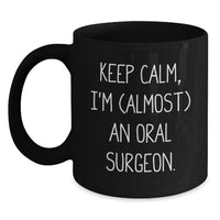 Load image into Gallery viewer, Oral Surgeon Funny Graduation Unique Gifts - Keep Calm, I'm (almost) An Oral Surgeon. Inspired Black Coffee Mug for Friends and Family. - Main