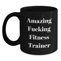 Load image into Gallery viewer, Funny Gifts from Friends for Fitness Trainer Black Coffee Mug, Amazing F--king Fitness Trainer Quote, Graduation Unique Gifts for Men, Microwave and Dishwasher Safe - Main