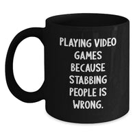 Load image into Gallery viewer, Funny Video Games Playing Black Coffee Mugs for Gamers from Friends, Unique Graduation Gifts for Men, Inspirational Quote - Playing Video Games Because Stabbing People Is Wrong. - Main