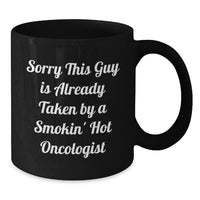 Load image into Gallery viewer, Funny Oncologist Gifts for Her, Black Coffee Mug, Unique Christmas Unique Gifts from Friends, 'Sorry This Guy Is Already Taken By A Smokin' Hot Oncologist' - Additional