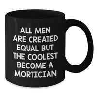 Load image into Gallery viewer, Mortician Coffee Mug, Funny Graduation Gift from Friends, &#39;All Men Are Created Equal But The Coolest Become A Mortician&#39;, Black 11oz or 15oz Microwave and Dishwasher Safe - Additional
