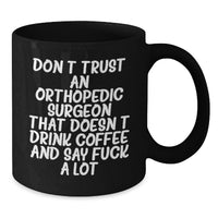 Load image into Gallery viewer, Funny Orthopedic Surgeon Gifts for Valentine's - Black Coffee Mug with 'Don't Trust An Orthopedic Surgeon That Doesn't Drink Coffee And Say F--k A Lot' Quote, Gifts from Men to Orthopedic Surgeon - Additional