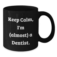 Load image into Gallery viewer, Dentist Humor Graduation Gift from Friends - Funny Black Coffee Mug with 'Keep Calm, I'm (almost) A Dentist.' Quote - Unique Birthday Unique Gift for Men or Women - Additional