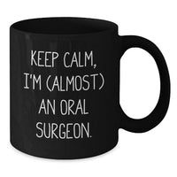 Load image into Gallery viewer, Oral Surgeon Funny Graduation Unique Gifts - Keep Calm, I'm (almost) An Oral Surgeon. Inspired Black Coffee Mug for Friends and Family. - Additional