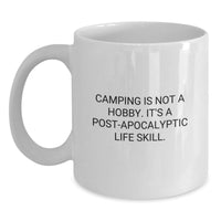 Load image into Gallery viewer, Camping Enthusiast Gifts from Friends for Birthday Unique Camping Mugs, Funny White Coffee Mugs with 'Camping Is Not A Hobby. It's A Post-apocalyptic Life Skill.' Quote - Main