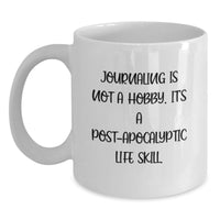 Load image into Gallery viewer, Funny Journaling Gifts for Men from Friends, White Coffee Mug - 'Journaling Is Not A Hobby. It's A Post-apocalyptic Life Skill.' - Main