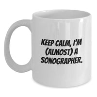 Load image into Gallery viewer, Funny Sonographer Gifts from Friends - White Coffee Mug for Graduation - 'Keep Calm, I'm (almost) A Sonographer' Inspirational Quotes - Main