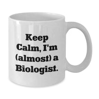 Load image into Gallery viewer, Funny Biologist Gifts for Graduation - White Coffee Mug with 'Keep Calm, I'm (almost) A Biologist.' Quote - Gifts from Family to Friends - Additional