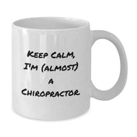 Load image into Gallery viewer, Funny Chiropractor Gifts for Graduation, White Coffee Mug, 'Keep Calm, I'm (almost) A Chiropractor.' - Additional