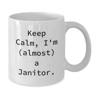 Load image into Gallery viewer, Funny Janitor Gifts for Men, White Coffee Mug with Keep Calm I'm (almost) A Janitor Quote, Gifts from Friends, Family, Coworkers - Additional
