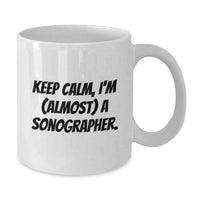 Load image into Gallery viewer, Funny Sonographer Gifts from Friends - White Coffee Mug for Graduation - 'Keep Calm, I'm (almost) A Sonographer' Inspirational Quotes - Additional