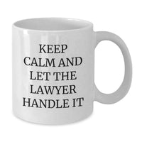 Load image into Gallery viewer, Funny Lawyer White Coffee Mug for Graduation Unique Gifts from Friends to Lawyer Men, 'Keep Calm And Let The Lawyer Handle It' Humor Lawyer Mug, White Ceramic 11oz or 15oz Capacity - Additional