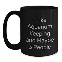 Load image into Gallery viewer, Funny Aquarium Keeping Gifts for Men from Friends, Unique Black Coffee Mug for Christmas, I Like Aquarium Keeping And Maybe 3 People Quote, Black 11oz or 15oz Ceramic Mug - Main
