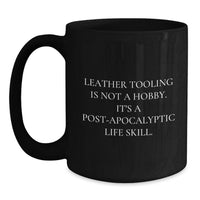 Load image into Gallery viewer, Leather Tooling Inspired Funny Gifts from Friends, Valentine's Unique Mugs for Men, Women, and Family, Black Coffee Mug, 'Leather Tooling Is Not A Hobby. It's A Post-apocalyptic Life Skill.' - Main