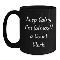 Load image into Gallery viewer, Funny Court Clerk Gifts from Friends - Keep Calm, I&#39;m (almost) A Court Clerk. - Black Coffee Mug for Court Clerk Birthday - Main
