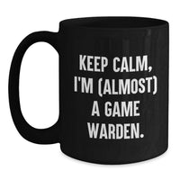 Load image into Gallery viewer, Funny Keep Calm Game Warden Gifts for Men - Unique Black Coffee Mug for Graduation - 'I'm almost a Game Warden' Funny Mug - Main