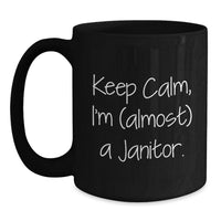 Load image into Gallery viewer, Funny Janitor Gifts from Friends, Black Coffee Mug, Keep Calm, I'm (almost) A Janitor. Graduation Unique Gifts - Main
