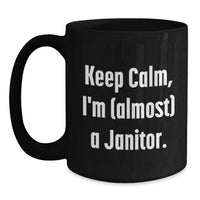 Load image into Gallery viewer, Funny Janitor Gifts from Friends, Keep Calm I'm (almost) A Janitor Black Coffee Mug, Graduation Unique Gifts for Janitor - Main