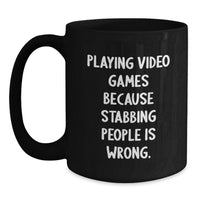 Load image into Gallery viewer, Funny Video Games Playing Black Coffee Mugs for Gamers from Friends, Unique Graduation Gifts for Men, Inspirational Quote - Playing Video Games Because Stabbing People Is Wrong. - Main