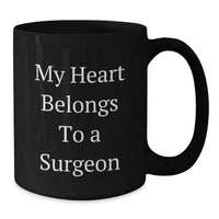 Load image into Gallery viewer, Funny Quote Gifts from Friends to a Special Surgeon Black Coffee Mug - Graduation Unique Gifts, Perfect for Men - My Heart Belongs To A Surgeon Mug, Great for Coworkers, Family, Men, Women - Additional