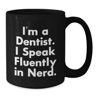 Load image into Gallery viewer, Fun and genius Dentist Gifts from Friends, Unique Graduation Presents for Men, Women, or Coworkers, I'm A Dentist. I Speak Fluently In genius. Black Coffee Mug - Additional