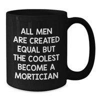 Load image into Gallery viewer, Mortician Coffee Mug, Funny Graduation Gift from Friends, &#39;All Men Are Created Equal But The Coolest Become A Mortician&#39;, Black 11oz or 15oz Microwave and Dishwasher Safe - Additional
