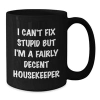 Load image into Gallery viewer, Funny Housekeeper Gifts from Men - 'I Can't Fix Stupid But I'm A Fairly Decent Housekeeper' Black Coffee Mug for Women or Coworkers, Ideal for Mother's Day Unique Gifts - Additional