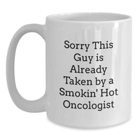 Load image into Gallery viewer, Funny Oncologist Gifts for Him - White Coffee Mug - Perfect Christmas Unique Gifts from Friends and Family with a Cute Quote - 'Sorry This Guy Is Already Taken By A Smokin' Hot Oncologist' - Main