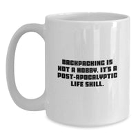 Load image into Gallery viewer, Funny Backpacking Gifts for Men - White Coffee Mug with 'Backpacking Is Not A Hobby. It's A Post-apocalyptic Life Skill.' Quote, Perfect for Dad on Father's Day from Family or Friends - Main