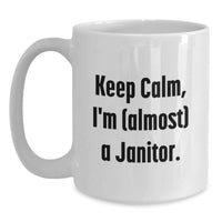 Load image into Gallery viewer, Funny Janitor Gifts for Men, White Coffee Mug, Keep Calm I'm (almost) A Janitor, Unique Graduation Unique Gifts from Friends, Family, Coworkers - Main