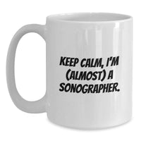 Load image into Gallery viewer, Funny Sonographer Gifts from Friends - White Coffee Mug for Graduation - 'Keep Calm, I'm (almost) A Sonographer' Inspirational Quotes - Main