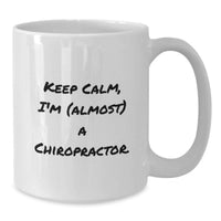 Load image into Gallery viewer, Funny Chiropractor Gifts for Graduation, White Coffee Mug, 'Keep Calm, I'm (almost) A Chiropractor.' - Additional