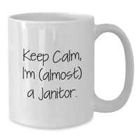 Load image into Gallery viewer, Funny Janitor Gifts for Him - White Coffee Mug, Keep Calm I'm Almost a Janitor, Ideal Gift for Graduation, Unique Present from Friends or Family - Additional