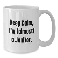 Load image into Gallery viewer, Funny Janitor Gifts for Men, White Coffee Mug, Keep Calm I'm (almost) A Janitor, Unique Graduation Unique Gifts from Friends, Family, Coworkers - Additional