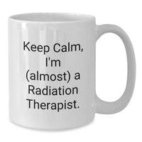 Load image into Gallery viewer, Radiation Therapist Gifts from Friends and Family - Graduation Unique Mugs, White Coffee Mug with Funny Quote 'Keep Calm, I'm (almost) A Radiation Therapist.' - Additional