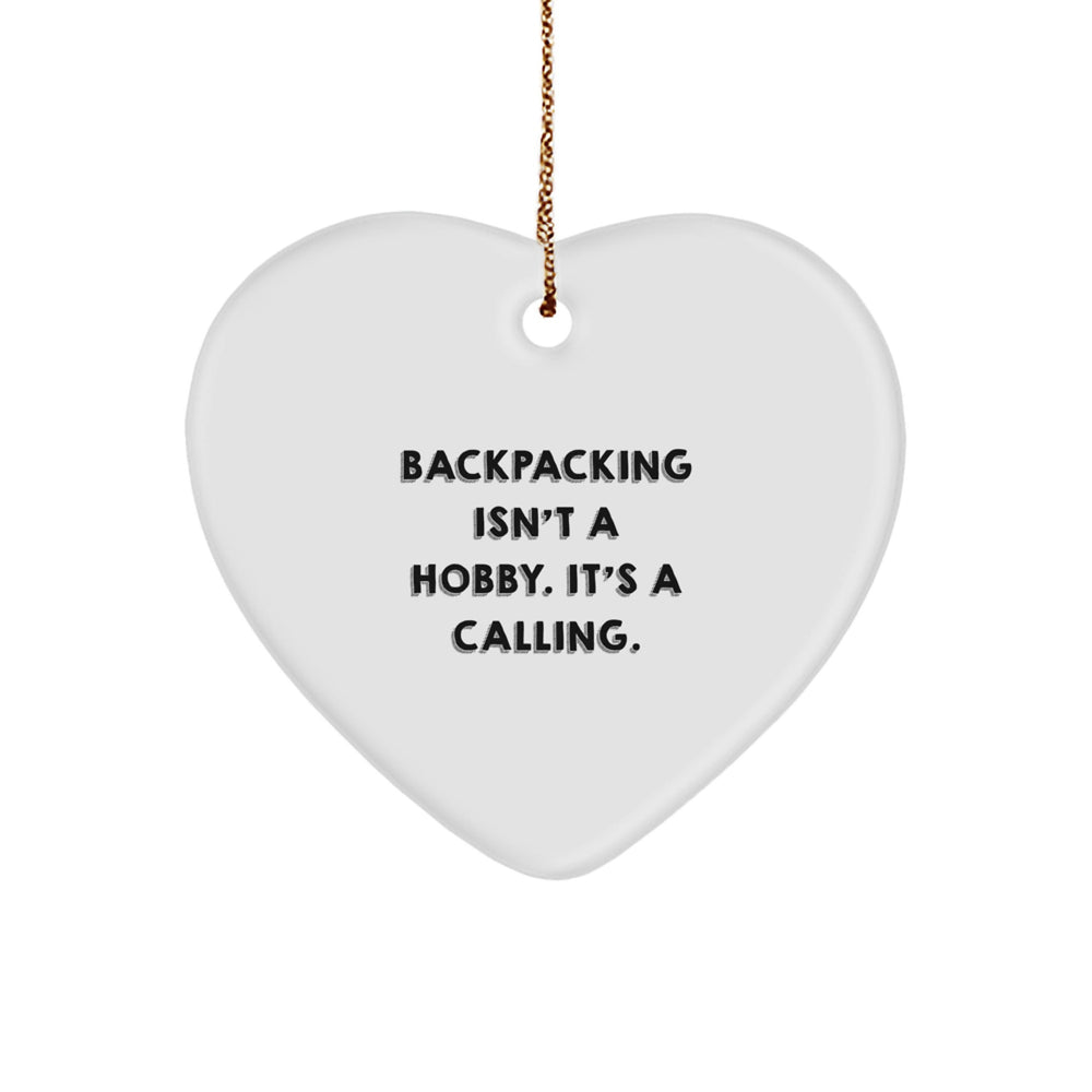 Funny Backpacking Gifts for Friends Christmas Heart Ornament, 'Backpacking Isn't A Hobby. It's A Calling.' Engraved Heart Shaped Decorative Item from Men, Gifts for Women, Coworkers, Family - Image 1