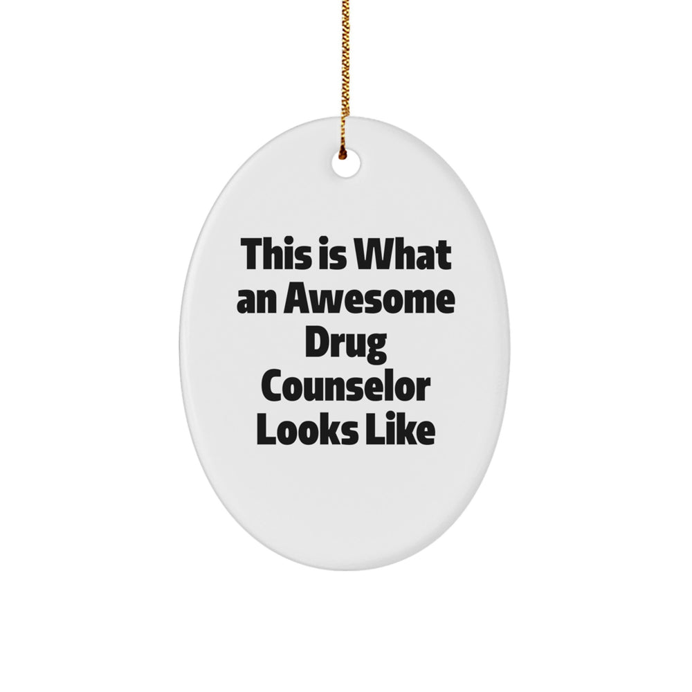 Funny Drug Counselor Gifts for Christmas, Oval Ornament with Quote: 'This Is What An Awesome Drug Counselor Looks Like', Gifts from Friends to Family - Image 1