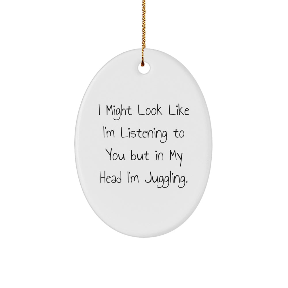Funny Juggling Gifts from Friends, 'I Might Look Like I'm Listening To You But In My Head I'm Juggling.' Oval Ornament for Juggling Enthusiasts, Men, Women, and Christmas Decor - Image 1