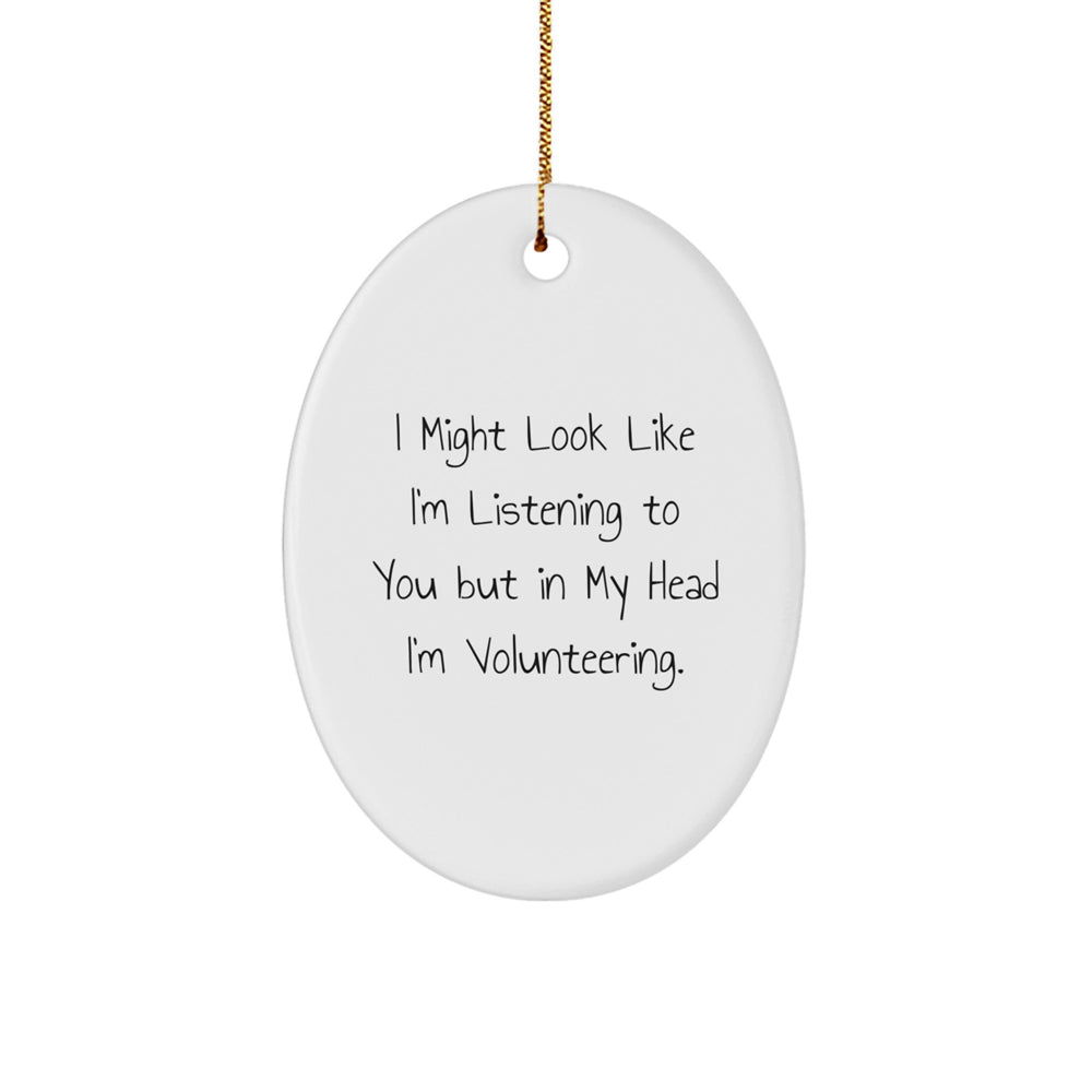 Funny Volunteering Gifts from Friends for Men - I Might Look Like I'm Listening To You But In My Head I'm Volunteering. Oval Ornament for Christmas - Image 1