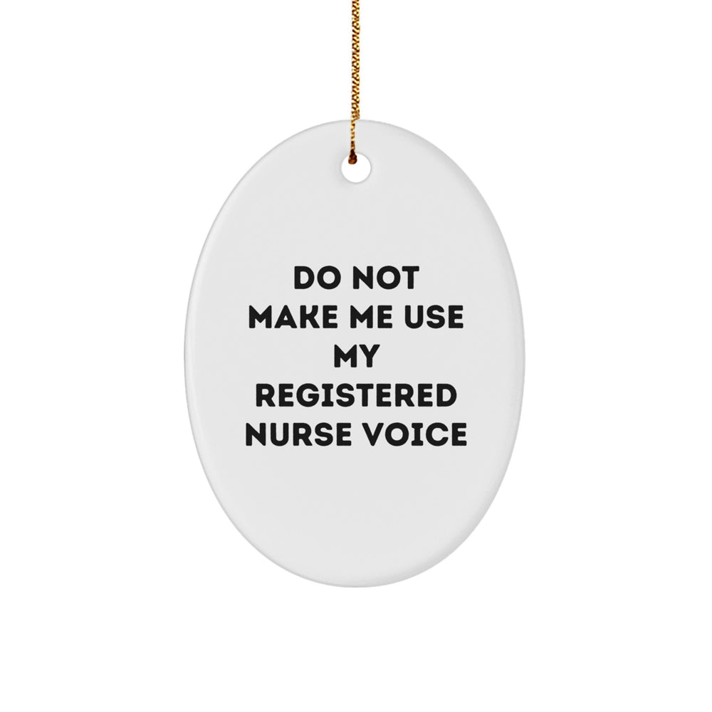 Christmas Unique Gifts from Men for Registered Nurses - Oval Ornament with Funny Quote 'Do Not Make Me Use My Registered Nurse Voice' - White Oval Shaped MDF with Gold Cord for Hanging - Image 1