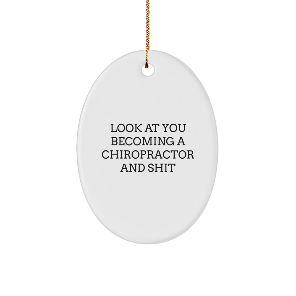 Funny Chiropractor Gifts for Friends, Coworkers, or Family - Oval Ornament with Look At You Becoming A Chiropractor And Shit Quote, Gifts from Men, Gifts for Chiropractor - Image 1