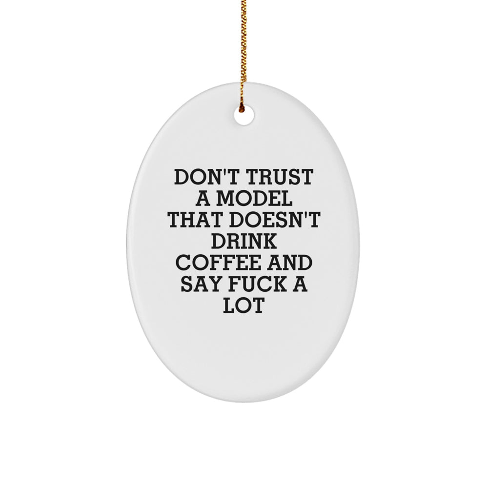 Funny Model Gifts: Oval Ornament for Christmas from Friends to Model - 'Don't Trust A Model That Doesn't Drink Coffee And Say F--k A Lot' Quote - Image 1